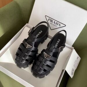 Prada Black Caged Jelly Sandals with Logo Plaque